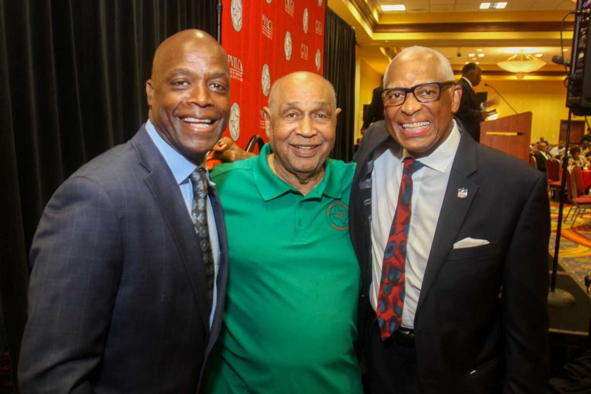 From left, Pro Football Hall of Famer Darrell Green, PVILCA Chairman of the Board Robert Brown, and Leroy Mitchell at the 2021 PVILCA Hall of Fame banquet at the Houston Marriott South at Hobby Airport in Houston on July 17, 2021.